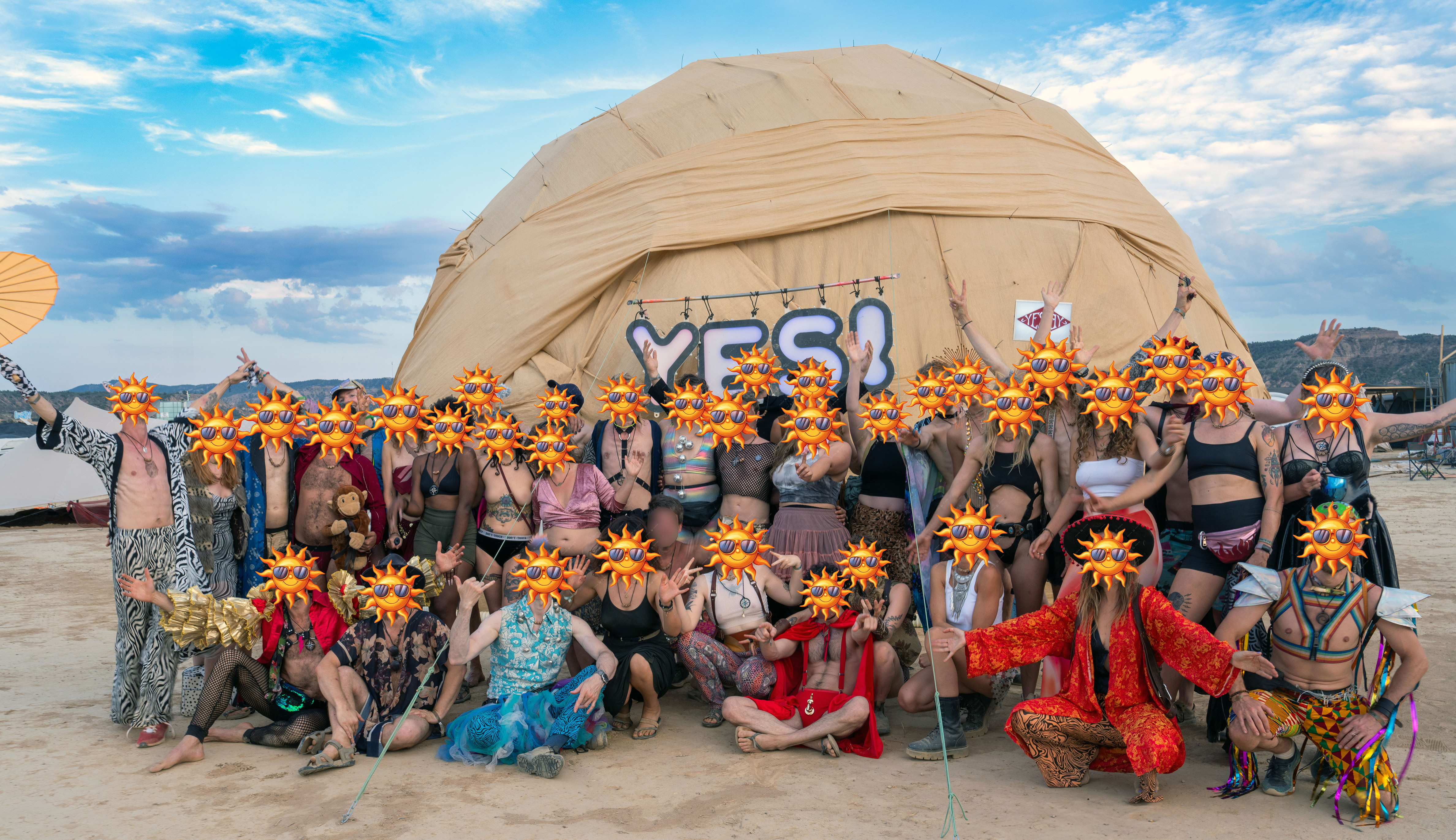 The Barrio YES! family gathered in front of the dome at a burn event in the Monegros desert
